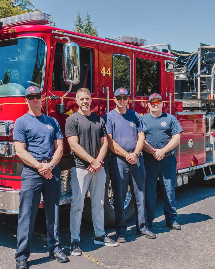 Andy Hess with his fire crew in front of the Moraga-Orinda engine | Hess Mortgages